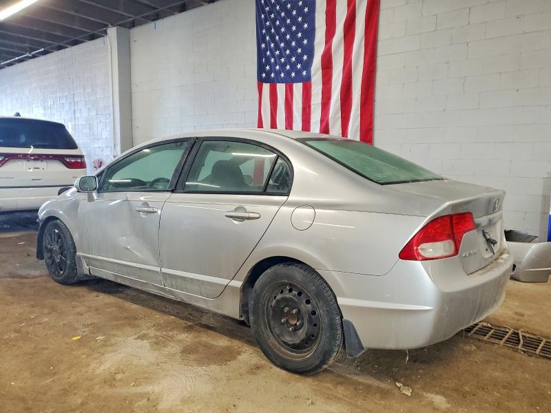 Photo 2 from auction – 2010 HONDA CIVIC LX with VIN 19XFA1F53AE063389