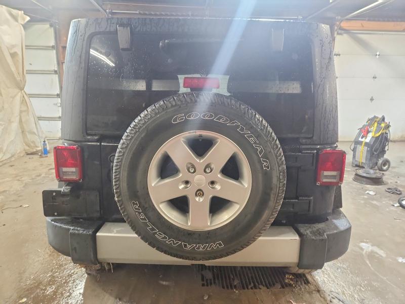 Photo 6 from auction – 2011 JEEP WRANGLER UNLIMITED with VIN 1J4BA7H15BL604635