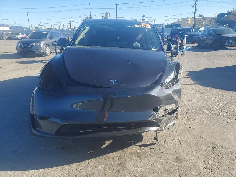 Photo 5 from auction – 2025 TESLA MODEL Y with VIN 7SAYGDED8SF266858