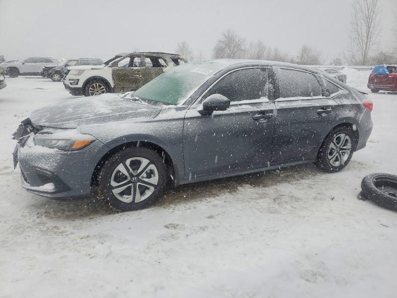 HONDA CIVIC LX 2023 with VIN 2HGFE2F25PH108041 - Photo from auction
