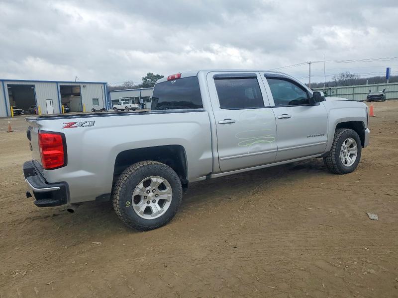 Photo 3 from auction – 2018 CHEVROLET SILVERADO with VIN 3GCUKREC0JG273231
