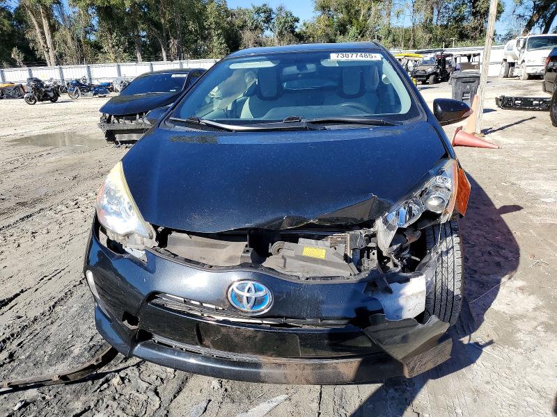 Photo 5 from auction – 2014 TOYOTA PRIUS C with VIN JTDKDTB32E1067853