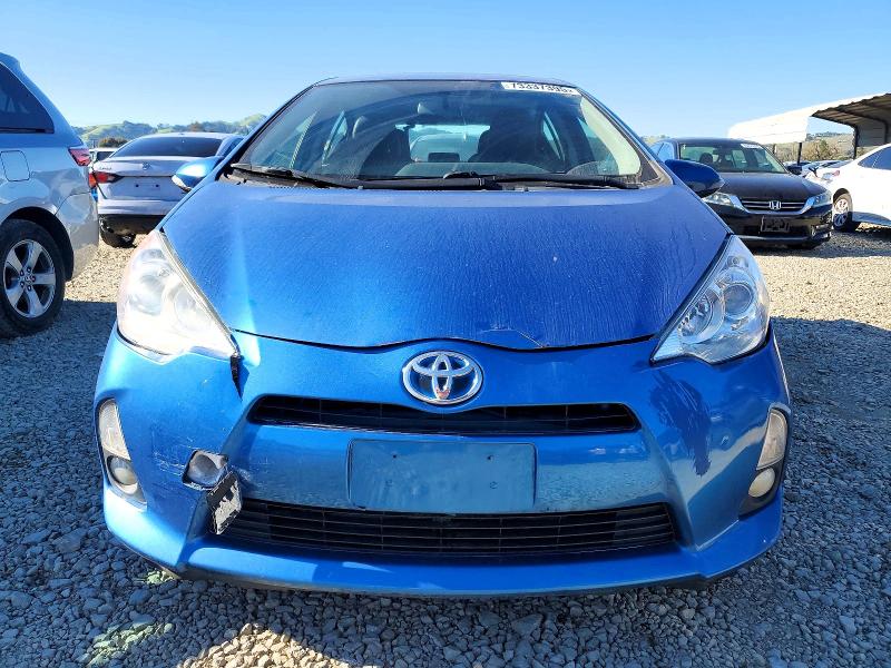 Photo 5 from auction – 2013 TOYOTA PRIUS C with VIN JTDKDTB31D1052212