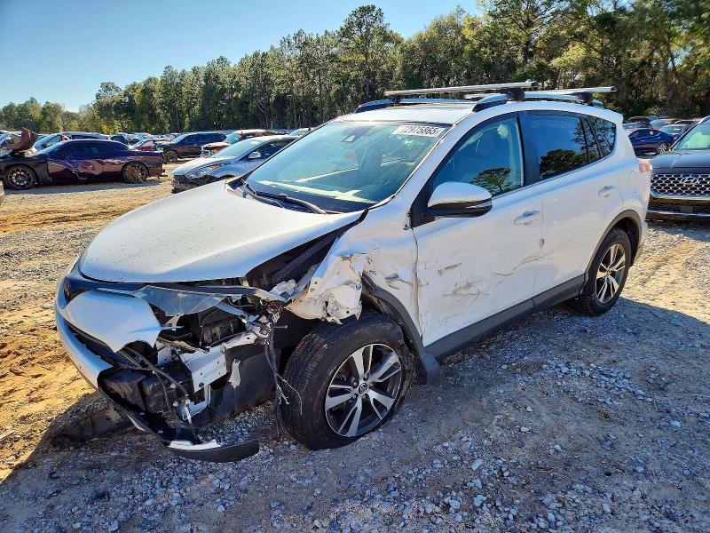 TOYOTA RAV4 XLE 2017 with VIN JTMRFREV9HD216397 - Photo from auction