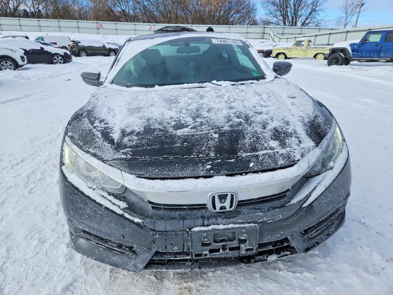 Photo 5 from auction – 2018 HONDA CIVIC with VIN 2HGFC4A55JH302787
