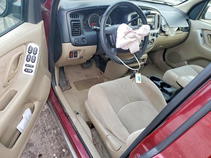 Photo 8 from auction – 2004 MAZDA TRIBUTE with VIN 4F2YZ04104KM03319