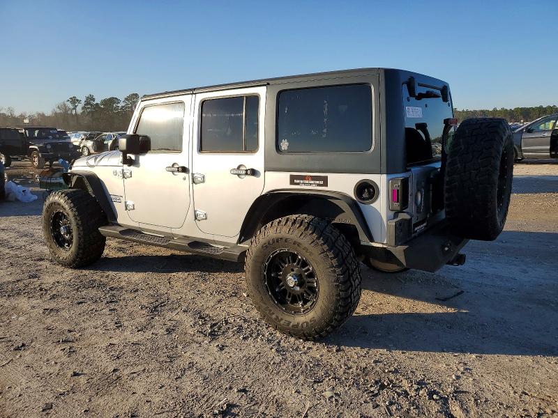 Photo 2 from auction – 2011 JEEP WRANGLER U with VIN 1J4HA3H1XBL586331