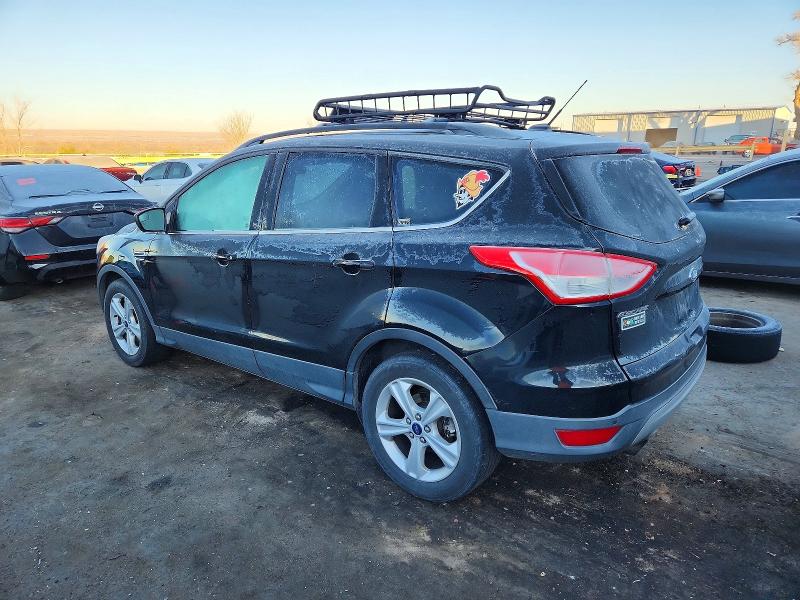Photo 2 from auction – 2016 FORD ESCAPE SE with VIN 1FMCU9G92GUA98621