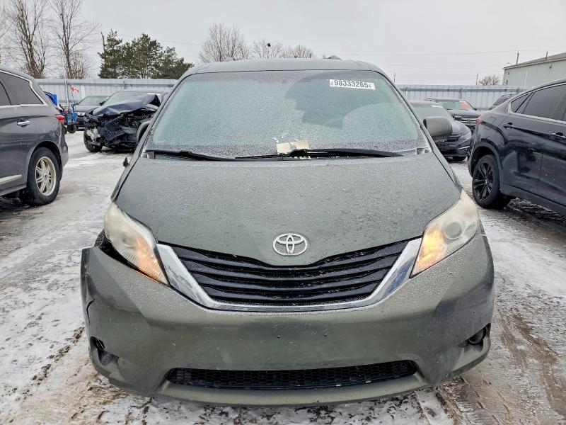 Photo 5 from auction – 2014 TOYOTA SIENNA LE with VIN 5TDKK3DC0ES513245