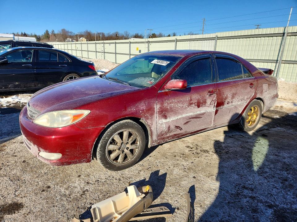 TOYOTA CAMRY LE 2004 with VIN 4T1BF30KX4U075731 - Photo from auction