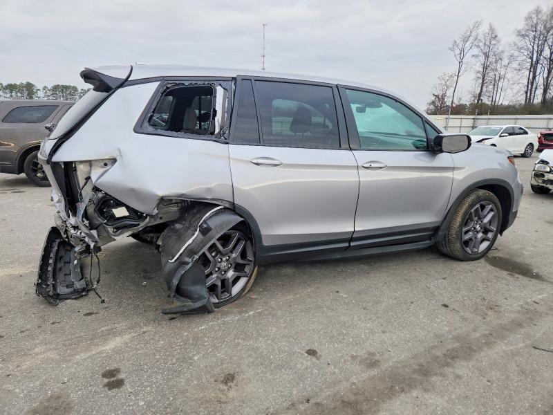 Photo 3 from auction – 2023 HONDA PASSPORT with VIN 5FNYF8H55PB027867