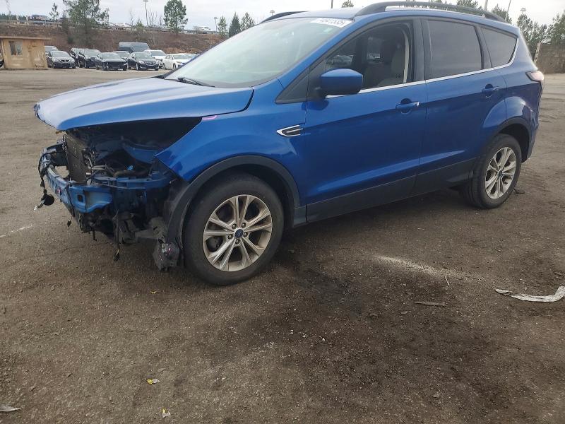 FORD ESCAPE SE 2017 with VIN 1FMCU0GD6HUE00879 - Photo from auction
