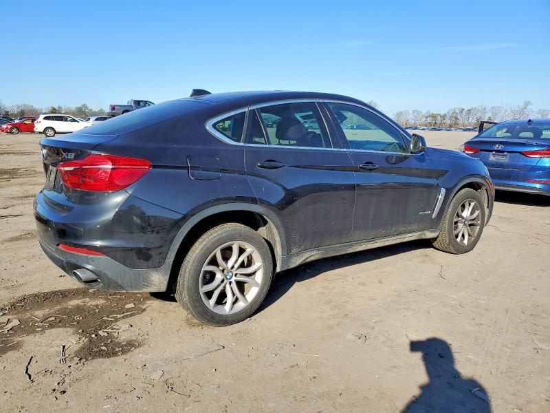 Photo 3 from auction – 2015 BMW X6 with VIN 5UXKU2C5XF0N77058