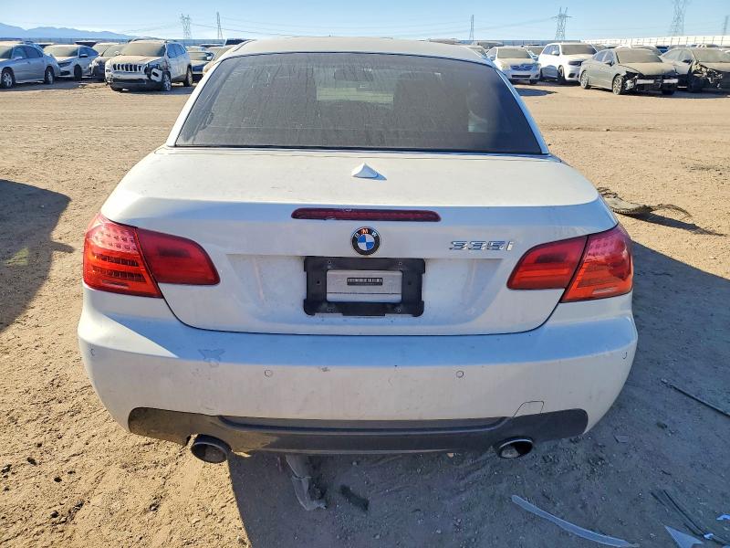 Photo 6 from auction – 2011 BMW 335 I with VIN WBADX7C51BE579967