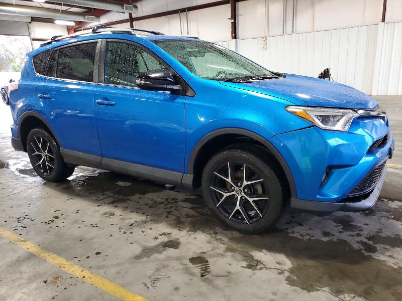 Photo 4 from auction – 2016 TOYOTA RAV4 with VIN 2T3NFREV5GW260137