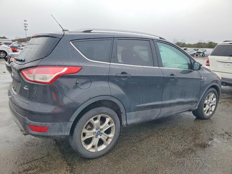 Photo 3 from auction – 2014 FORD ESCAPE with VIN 1FMCU9J98EUA23363