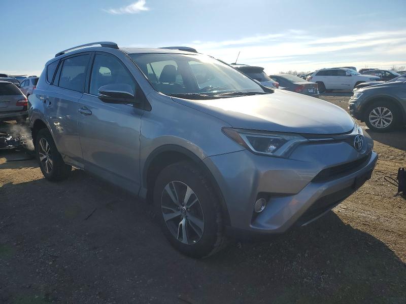 Photo 4 from auction – 2016 TOYOTA RAV4 XLE with VIN 2T3RFREV4GW411633