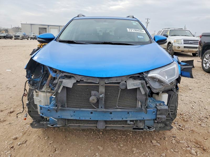 Photo 5 from auction – 2016 TOYOTA RAV4 XLE with VIN JTMWFREV2GJ065065