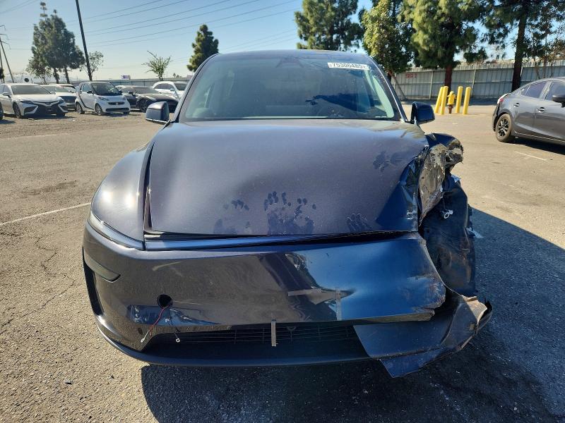 Photo 5 from auction – 2026 TESLA MODEL Y with VIN 7SAYGDED5TF429600