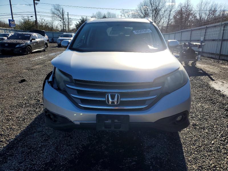 Photo 5 from auction – 2014 HONDA CR-V with VIN 2HKRM4H70EH698799