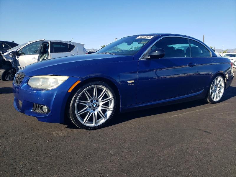 BMW 335 IS 2011 with VIN WBADX1C57BE394125 - Photo from auction
