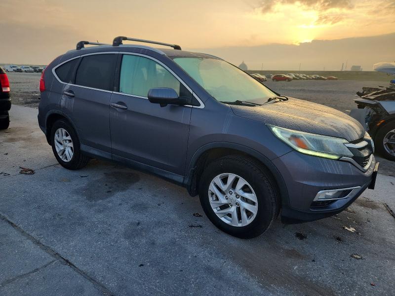 Photo 4 from auction – 2016 HONDA CR-V EXL with VIN 2HKRM4H79GH669143