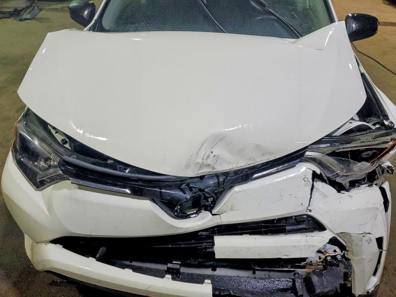 Photo 12 from auction – 2017 TOYOTA RAV4 LE with VIN JTMZFREV6HJ148528