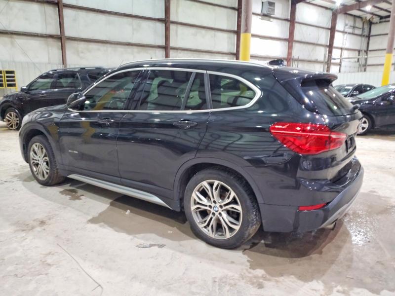 Photo 2 from auction – 2017 BMW X1 XDRIVE2 with VIN WBXHT3Z35H4A52100
