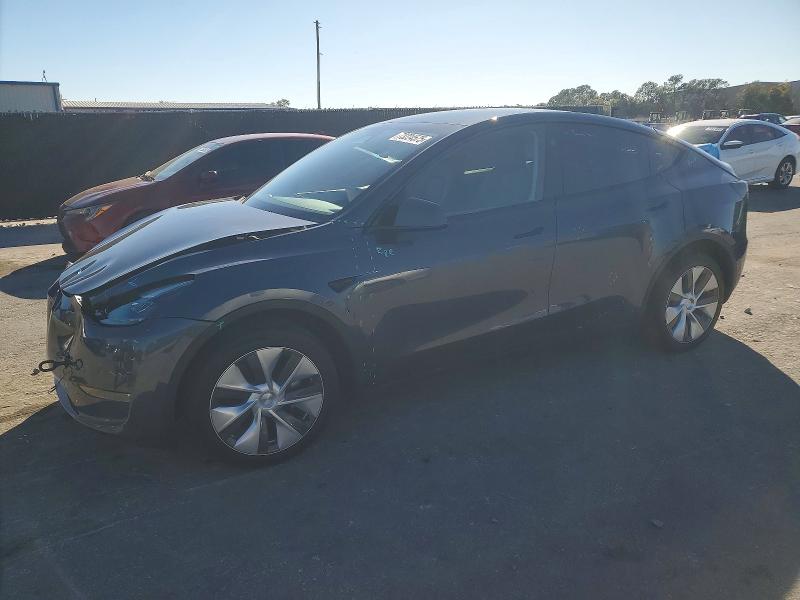 TESLA MODEL Y 2023 with VIN 7SAYGDEE1PA180420 - Photo from auction