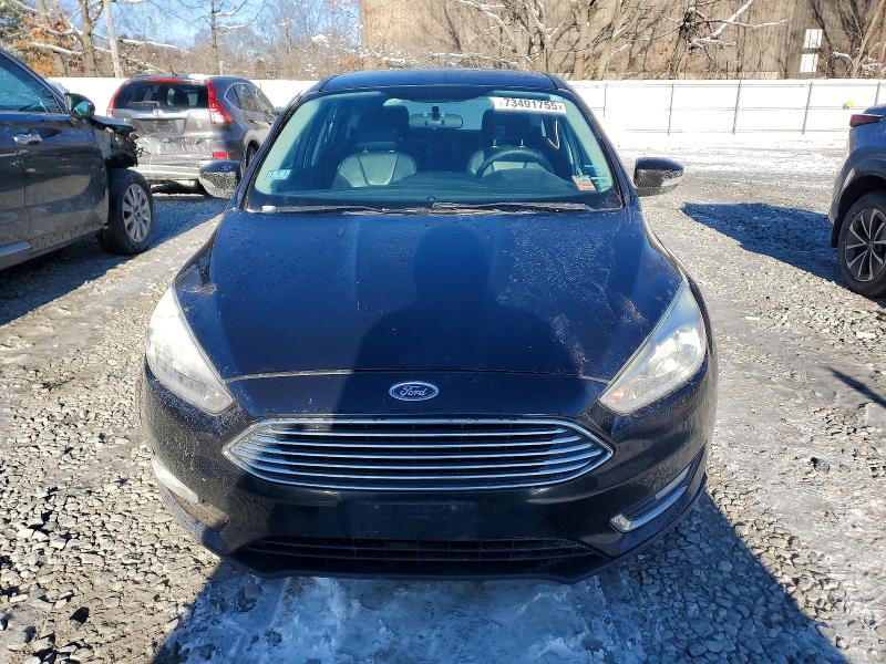 Photo 5 from auction – 2015 FORD FOCUS TITA with VIN 1FADP3N20FL272702