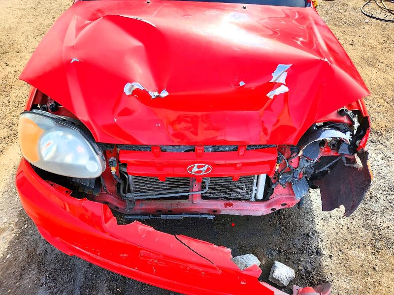 Photo 11 from auction – 2003 HYUNDAI ACCENT with VIN KMHCG35C43U256244