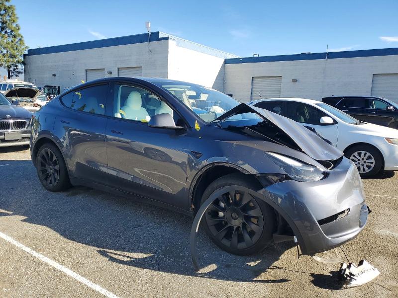 Photo 4 from auction – 2023 TESLA MODEL Y with VIN 7SAYGDED2PF947511