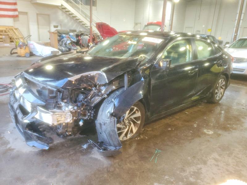 HONDA CIVIC EX 2016 con VIN 2HGFC2F79GH521744 - Foto de la subasta