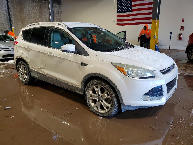 Photo 4 from auction – 2014 FORD ESCAPE TIT with VIN 1FMCU9J90EUD13371