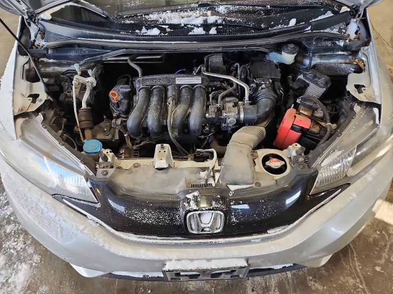 Photo 11 from auction – 2016 HONDA FIT EX with VIN JHMGK5H77GX040759