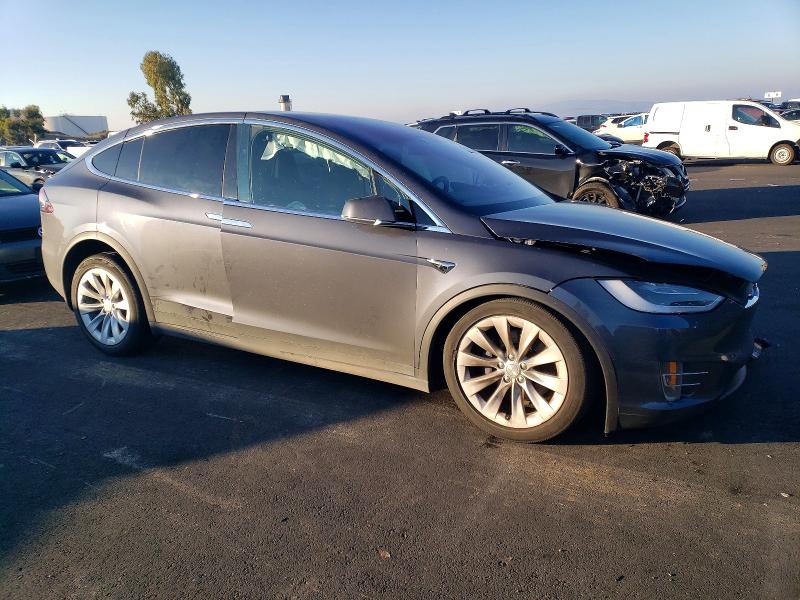 Photo 4 from auction – 2018 TESLA MODEL X with VIN 5YJXCBE21JF130125