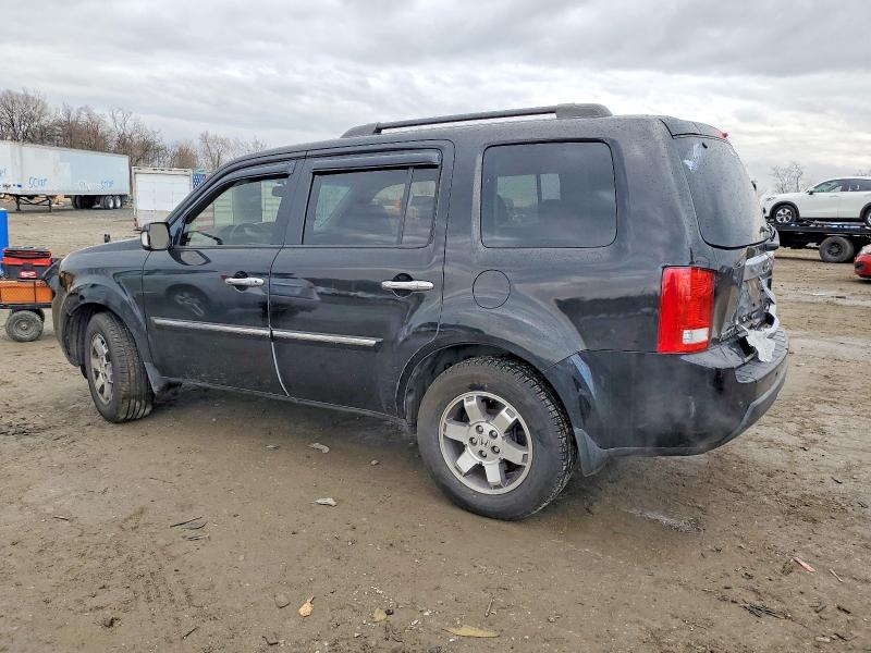Photo 2 from auction – 2011 HONDA PILOT TOUR with VIN 5FNYF3H91BB053817