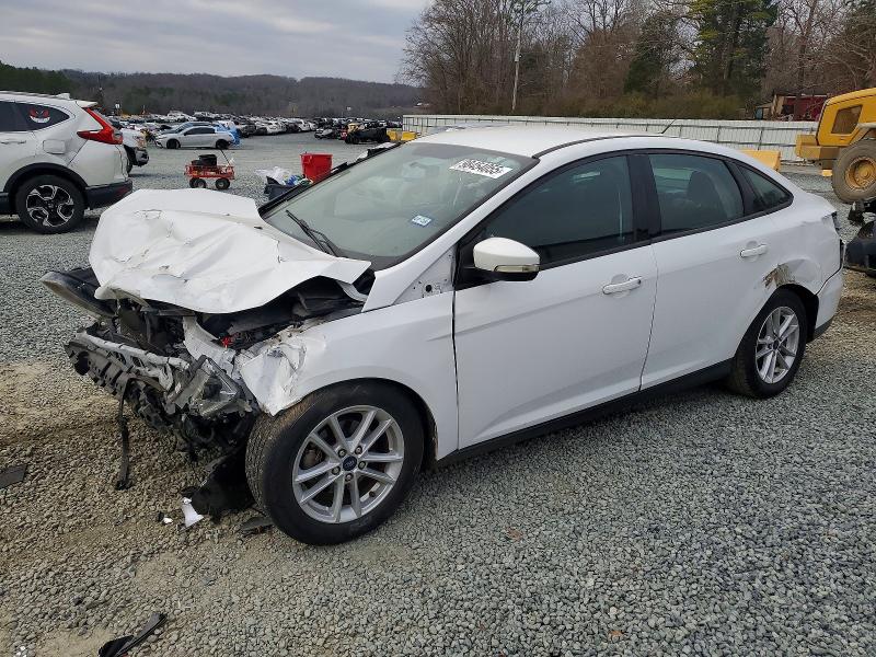 FORD FOCUS SE 2017 with VIN 1FADP3F20HL317090 - Photo from auction