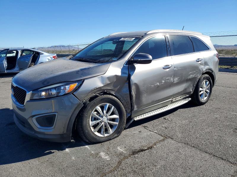 KIA SORENTO 2016 with VIN 5XYPG4A37GG125964 - Photo from auction
