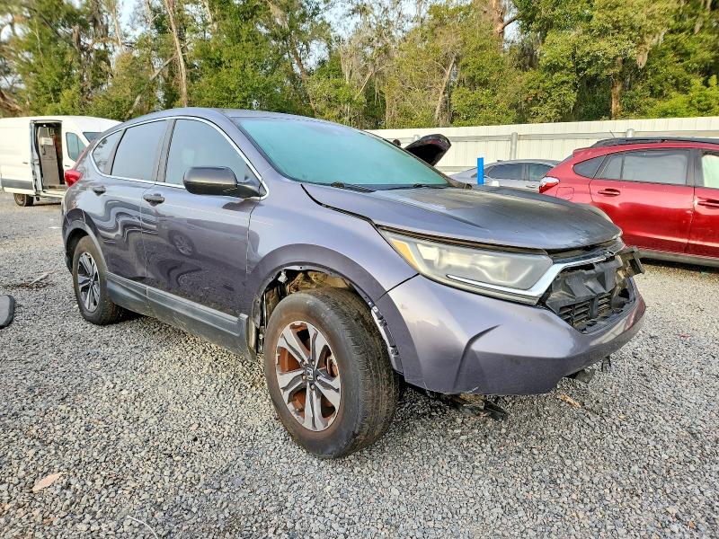 Photo 4 from auction – 2017 HONDA CR-V LX with VIN 7FARW5H36HE001883