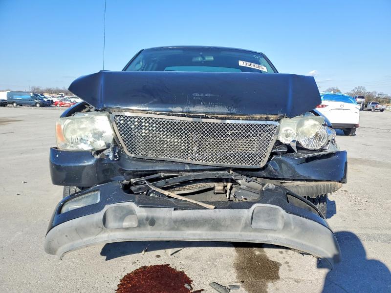 Photo 5 from auction – 2004 FORD F150 with VIN 1FTRX12W64NB93256