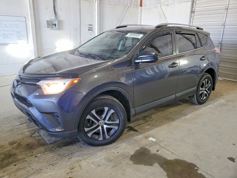 Photo 1 from auction – 2018 TOYOTA RAV4 LE with VIN JTMBFREV7JJ214429
