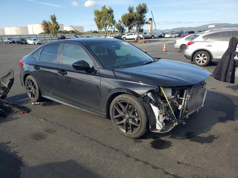 Photo 4 from auction – 2022 HONDA CIVIC SPOR with VIN 2HGFE2F50NH514946