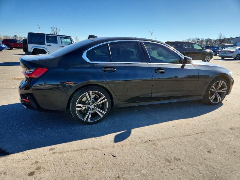 Photo 3 from auction – 2021 BMW 330I with VIN 3MW5R1J00M8B49114