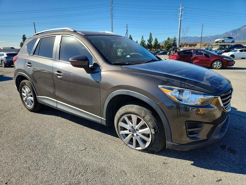 Photo 4 from auction – 2016 MAZDA CX-5 with VIN JM3KE2BY8G0906603