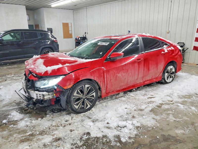 HONDA CIVIC 2017 with VIN 2HGFC1F71HH640125 - Photo from auction