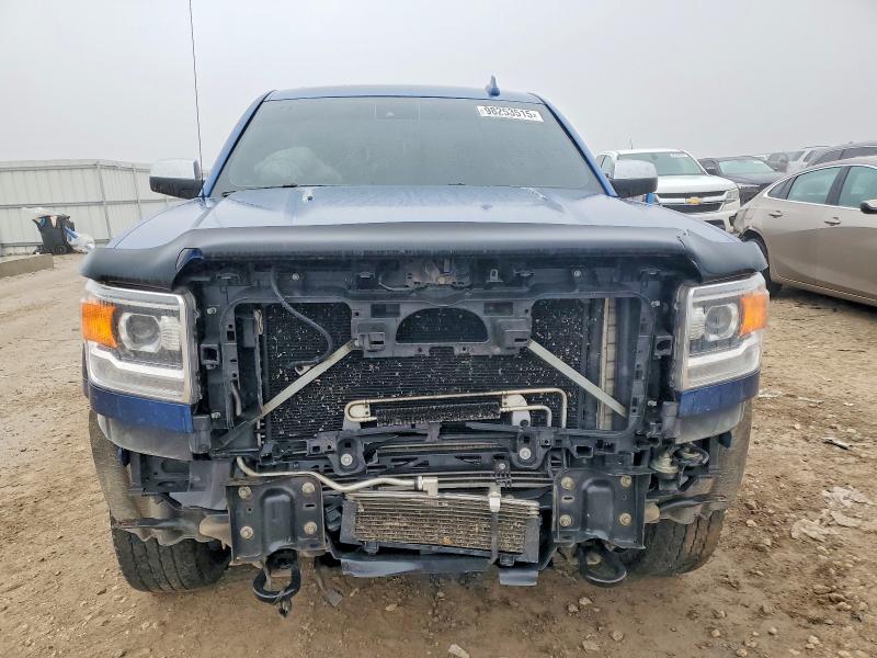 Photo 5 from auction – 2015 GMC SIERRA K25 with VIN 1GT120E8XFF610359