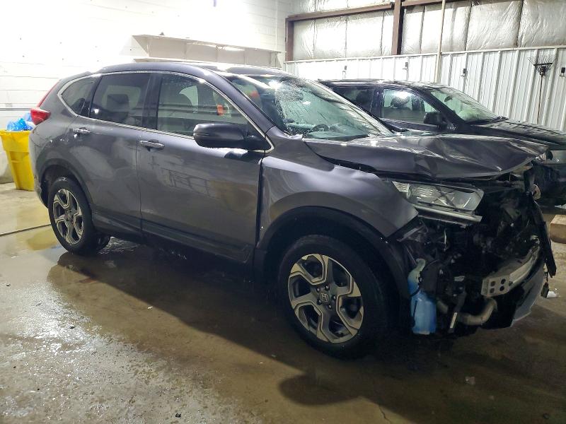 Photo 4 from auction – 2019 HONDA CR-V with VIN 5J6RW2H87KL026005