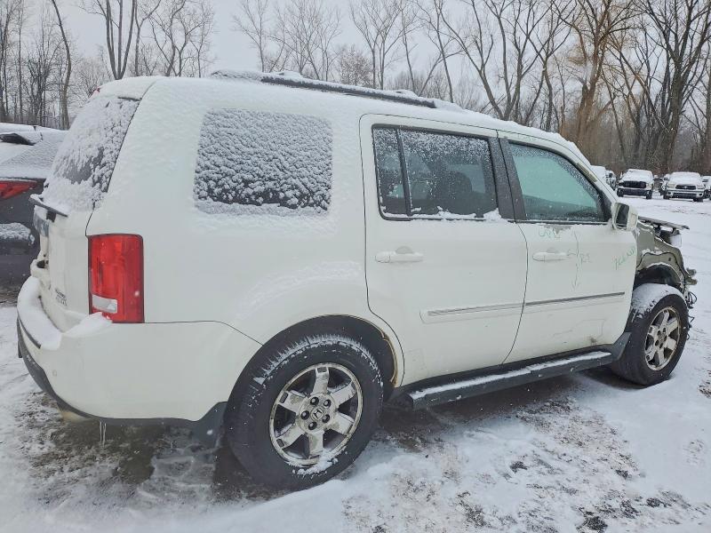 Photo 3 from auction – 2011 HONDA PILOT TOUR with VIN 5FNYF4H96BB038011