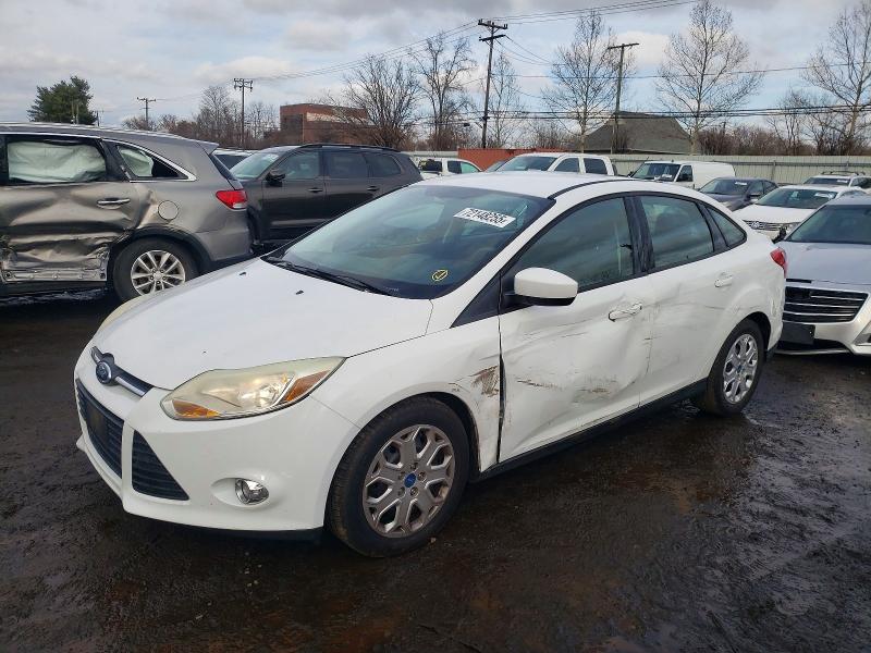 FORD FOCUS 2012 with VIN 1FAHP3F22CL169759 - Photo from auction